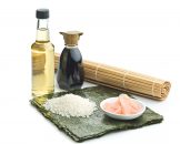 The sushi ingredient. Nori, rice, rice vinegar, pickled ginger and soy sauce isolated on white background.